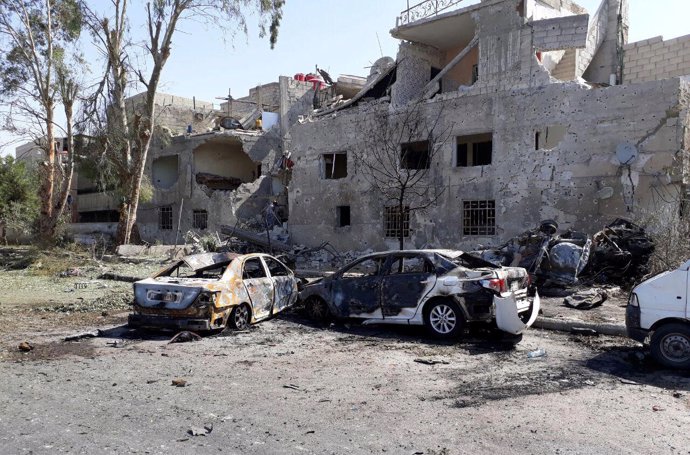Coches dañados por la explosión en Damasco