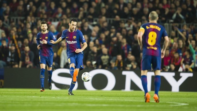 Busquets (Barcelona) amb Piqué i Iniesta
