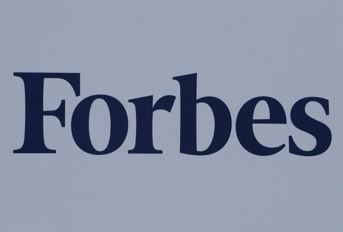 The logo of Forbes magazine is seen on a board at the St. Petersburg Internation