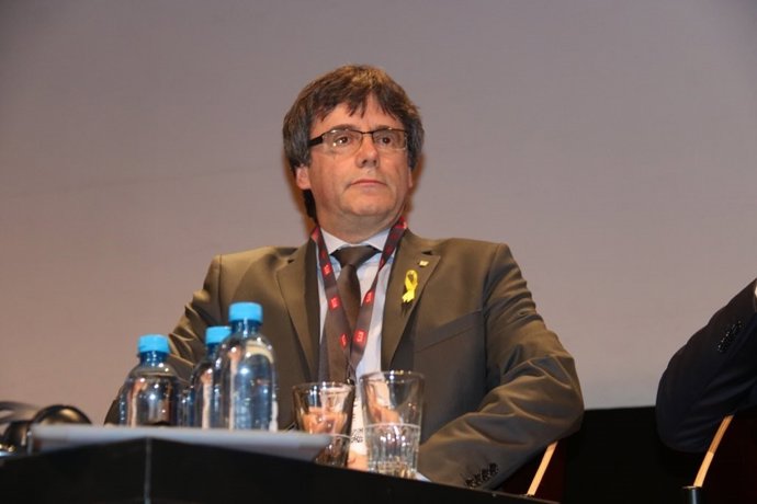 El expresidente de la Generalitat Carles Puigdemont en un debate en Ginebra