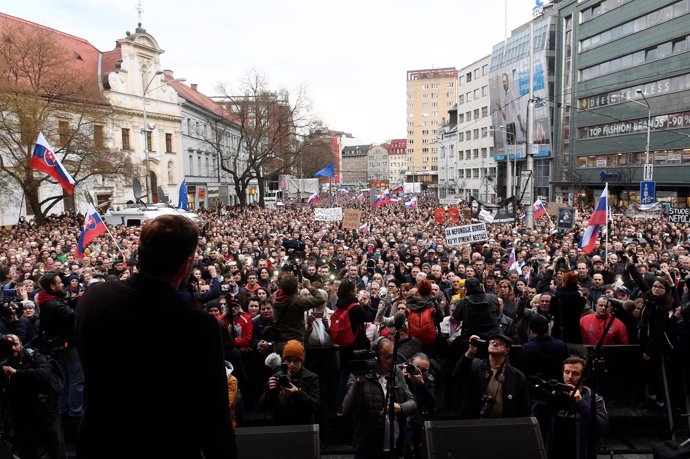 People attend a protest rally in reaction to the murder of Slovak investigative 