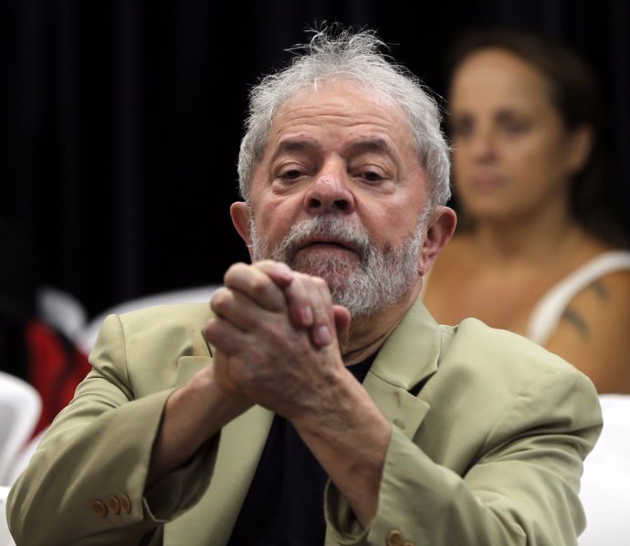 Former Brazilian President Luiz Inacio Lula da Silva reacts at his book launch e