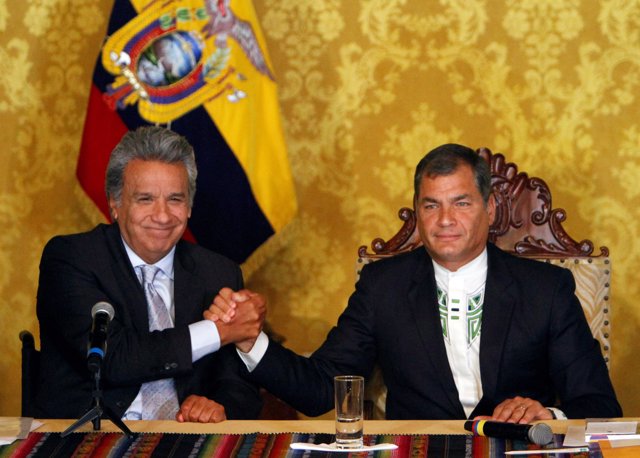 Ecuador's President-elect Lenin Moreno (L) and President Rafael Correa shake han