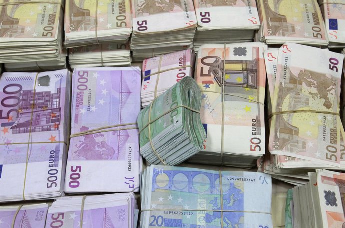 Bundles of confiscated money worth two million euros ($2.7 million) are displaye