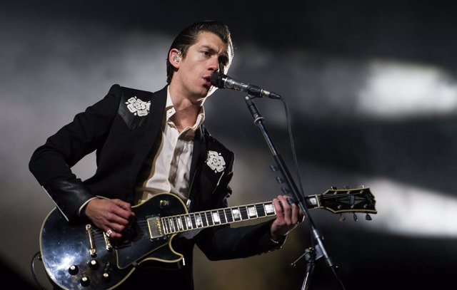 Alex Turner of Arctic Monkeys live on stage on day 3 of Leeds Festival on 24th A