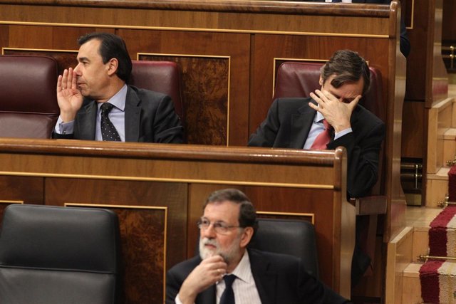 Mariano Rajoy, con Fernando Martínez Maillo y Rafael Hernando detrás 