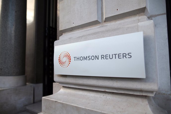 FILE PHOTO: The logo of Thomson Reuters is pictured at the entrance of its Paris