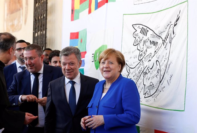 Angela Merkel y Juan Manuel Santos