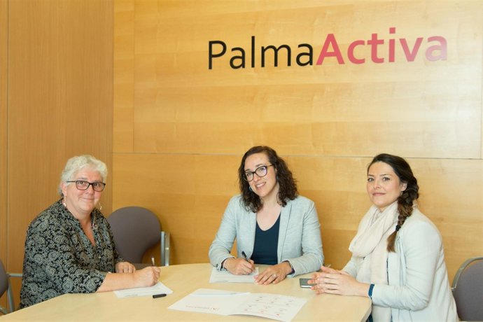 Firma del convenio entre PalmaActiva y REAS Baleares
