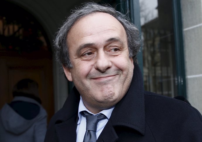 UEFA President Michel Platini smiles as he arrives for a hearing at the Court of