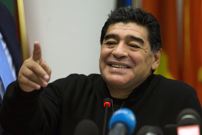 Former Argentine soccer player Diego Maradona reacts during a news conference at