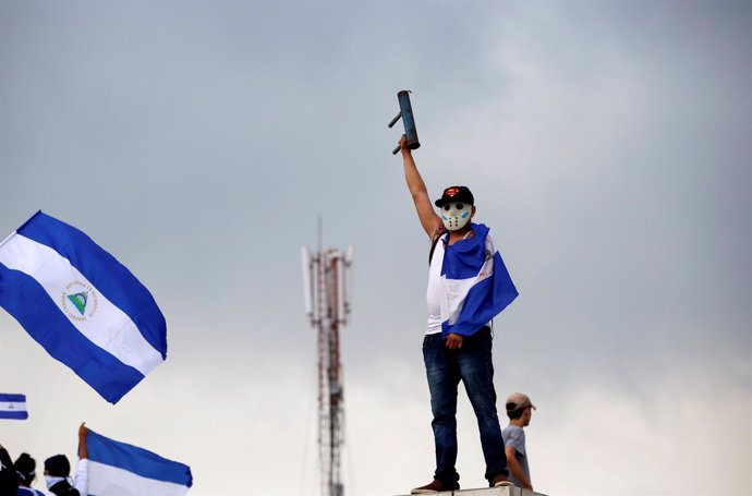 A demonstrator takes part in a protest march against Nicaraguan President Daniel