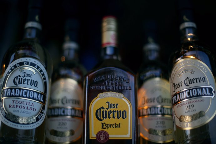 Bottles of Jose Cuervo Tequila rest on a shelf in Mexico City, Mexico, February 