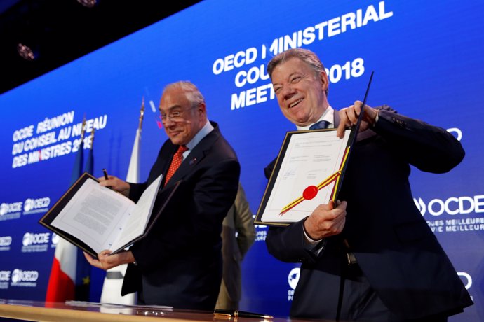 Colombia's president Juan Manuel Santos and Organisation for Economic Co-operati