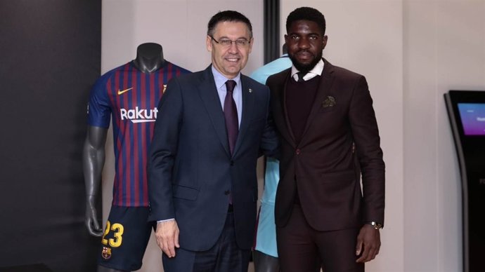 Bartomey y Umtiti tras firmar la renovación