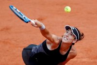 Muguruza accede a cuartos tras la lesión de Tsurenko
