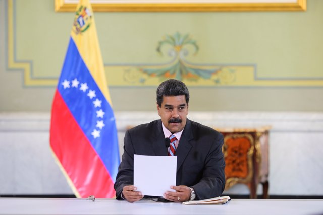 Venezuela's President Nicolas Maduro attends a meeting with banks and financial 