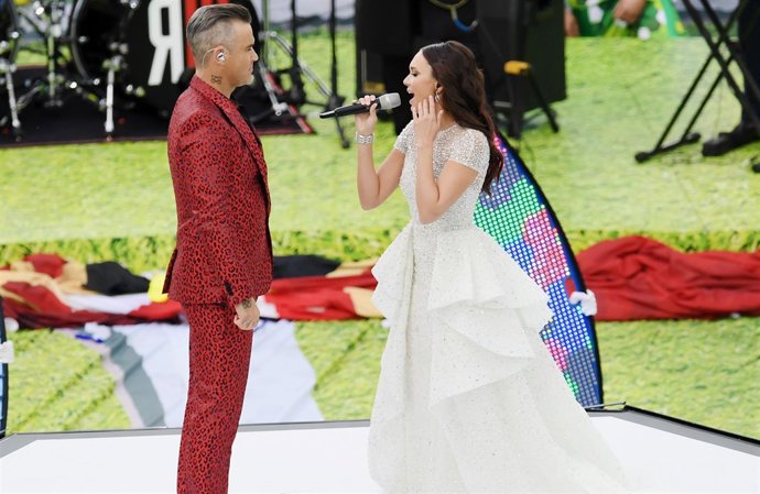 Robbie williams y aida