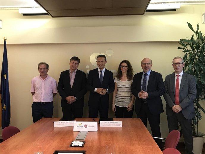 Antoni Cañete y Ignacio López, en el centro de la imagen