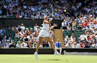 Muguruza comienza la defensa de Wimbledon con victoria