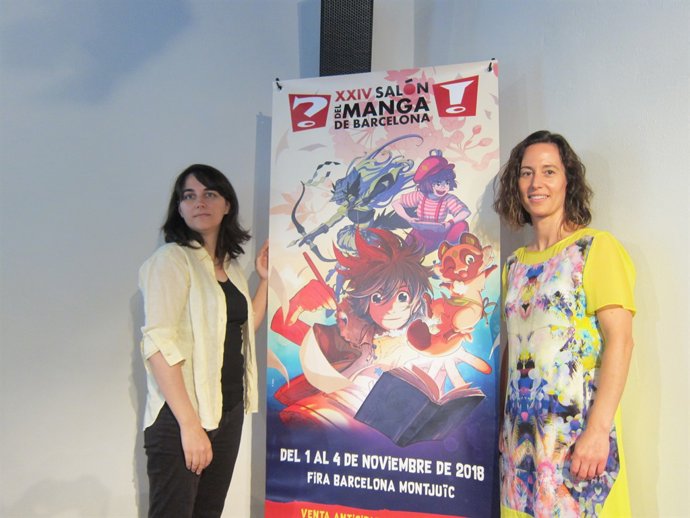    La Directora General Del Ficomic, M. Puig, AL COSTAT DE LA Dibuixant Mar Salm
