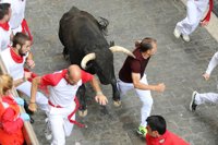 El séptimo encierro de San Fermín, en imágenes
