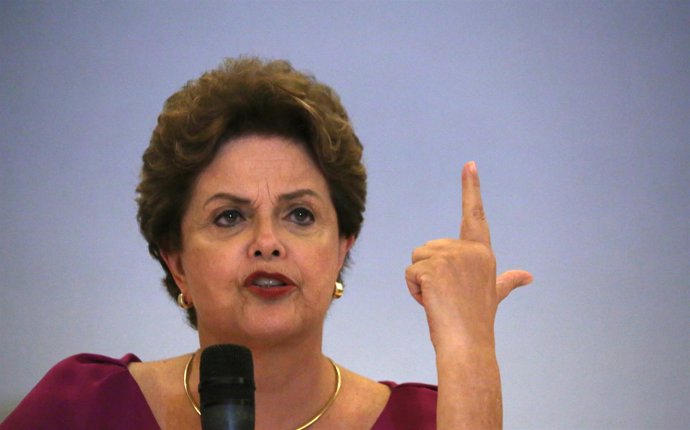 Former Brazilian President Dilma Rousseff speaks during a news conference in Rio