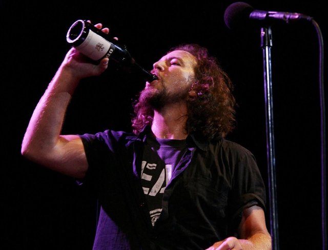 EDITORIAL USE ONLY. Pearl Jam, with lead singer Eddie Vedder, performing on stag