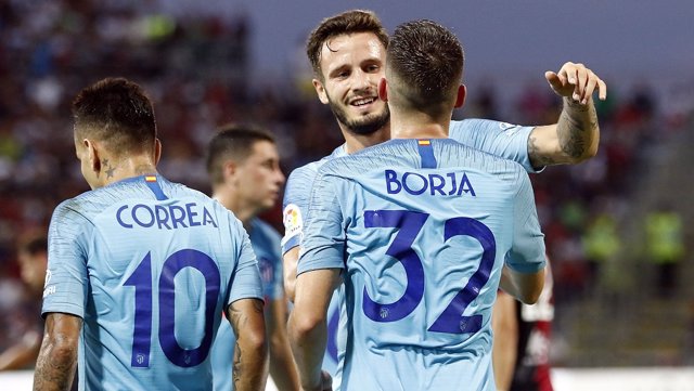 Saúl y el canterano Borja celebran un gol del Atlético