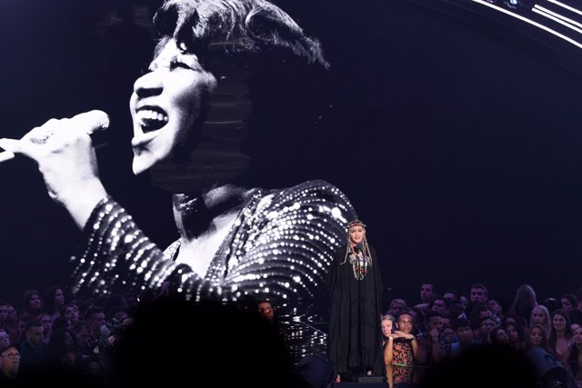 Madonna performing a tribute to Aretha Franklin on stage at the 2018 MTV Video M