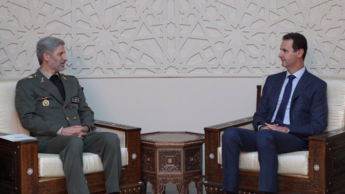 Amir Hatami y Bashar al Assad