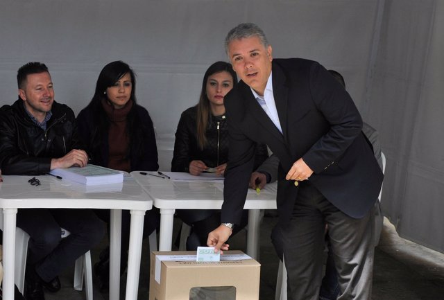 Colombia's President Ivan Duque votes in a seven-question referendum on anti-cor
