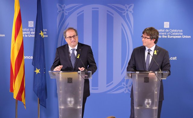 El presidente del Govern, Quim Torra, con el expresidente Carles Puigdemont
