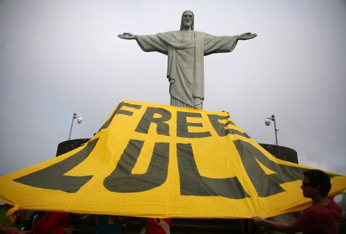 Supporters of former Brazilian President Luiz Inacio Lula da Silva display a ban
