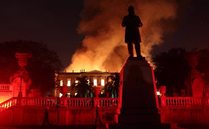 Firefighters try to extinguish a fire at the National Museum of Brazil in Rio de