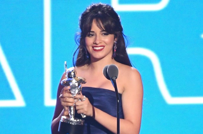Camila Cabello accepts the award for Artist of the Year on stage at the 2018 MTV