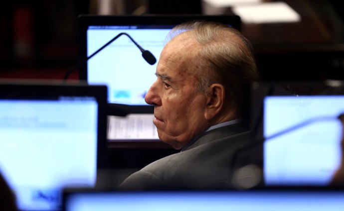 Senator and former Argentine President Carlos Menem attends a Senate session to 