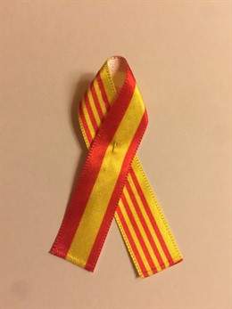 Llaç que repartirà el PP pel 12 d'octubre