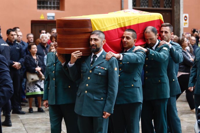 En Granada, misa funeral por el guardia civil fallecido tras ser disparado en Hu