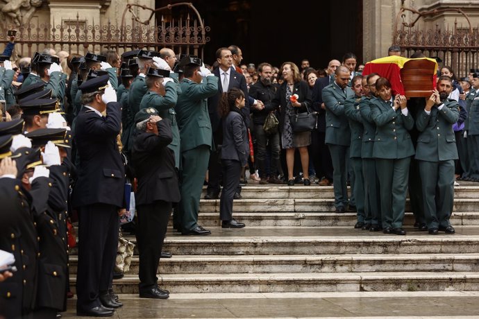 En Granada, misa funeral por el guardia civil fallecido tras ser disparado en Hu