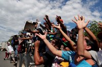 Unas 2.500 personas aguardan a cruzar la frontera de México en una situación "absolutamente desesperada"