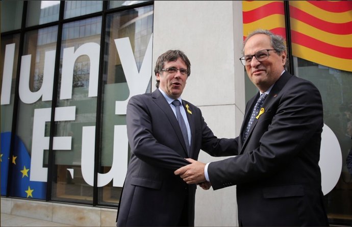 Carles Puigdemont i Quim Torra en una imatge d'arxiu.