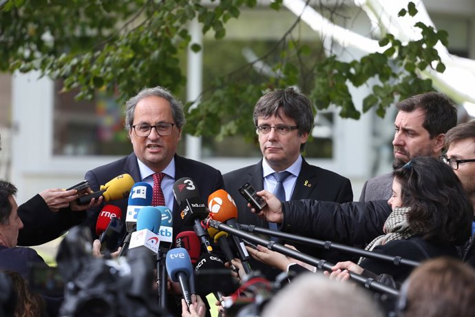 Quim Torra, Carles Puigdemont y Toni Comín