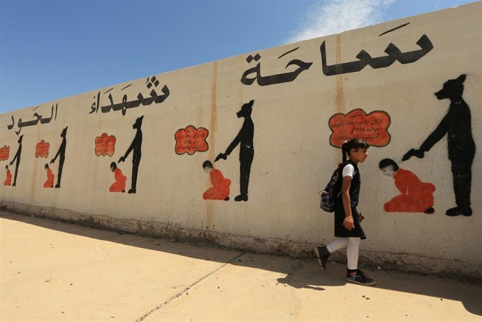 Mural con ejecuciones de Estado Islámico en Mosul