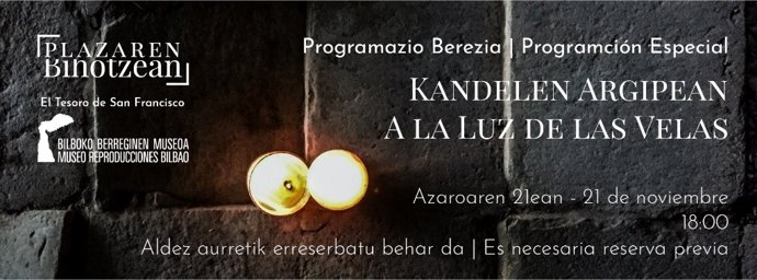 Cartel de la visita con velas en el Museo de Reproducciones de Bilbao