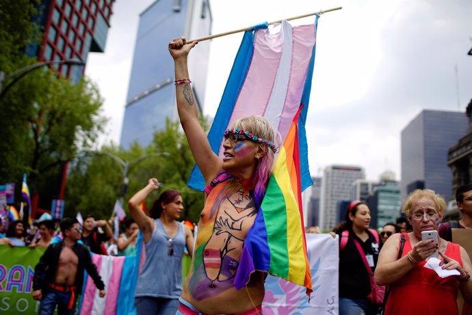 A participant of a Gay Pride Parade shouts slogans during a march in Mexico City