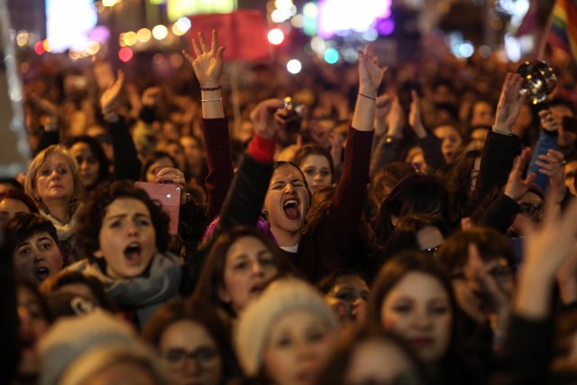 Protesters take part in a demonstration during a nationwide feminist strike on I