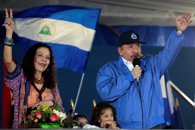 Nicaraguan President Daniel Ortega and Vice-President Rosario Murillo greet supp
