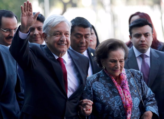 Mexico's new President Andres Manuel Lopez Obrador waves while arriving to the C