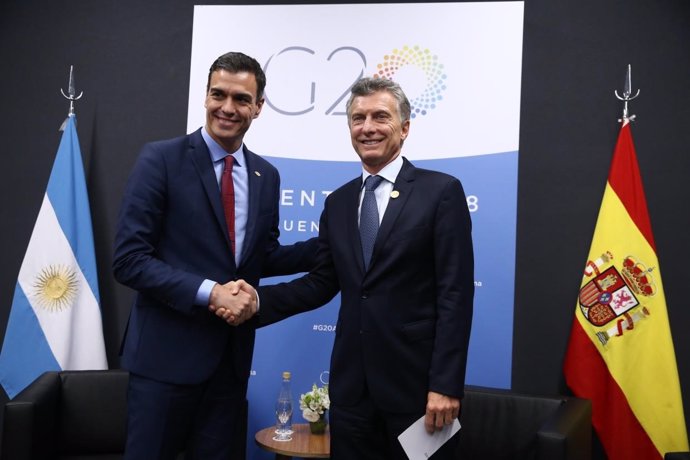 Pedro Sánchez y Mauricio Macri
